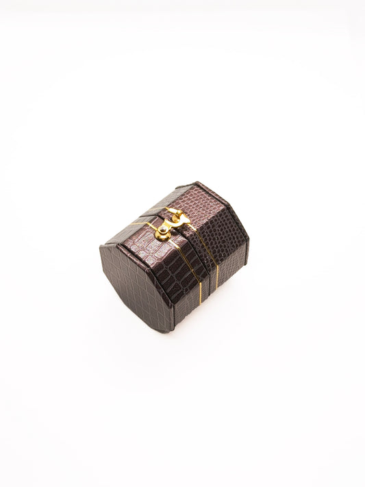 a dark brown vintage ring holder box with a dainty hook latch